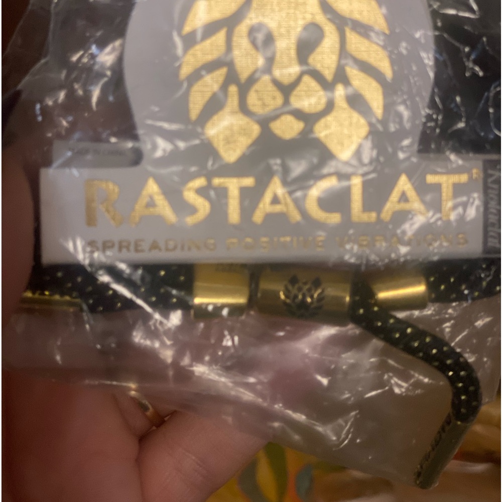 Black and gold Rastaclat